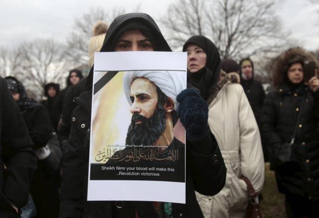 A Muslim American protests against the execution of Shia Muslim cleric Nimr al-Nimr in Saudi Arabia, during a rally in Dearborn, Michigan January 3, 2016.. PHOTO: REUTERS