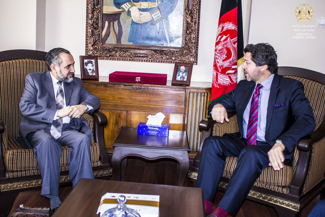 This picture released by Afghan Foreign Ministry shows Pakistan Ambassador in Kabul Abrar Hussain (L) meeting with Afghan deputy foreign minister Hekmat Khalil Karzai (R) in Kabul on February 14, 2016.