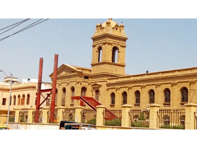 A pedestrian bridge is being built inside DJ Science College to connect its two campuses located on both sides of Dr Ziauddin Ahmed Road. PHOTO: COURTESY FARHAN ANWAR