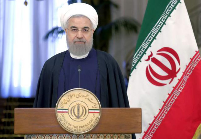 Iranian President Hassan Rouhani attend a news conference with Swiss President Johann Schneider-Ammann in Tehran February 27, 2016. PHOTO: REUTERS