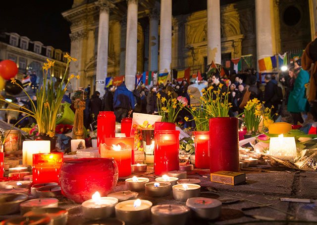 People mourn the victims of Brussels attacks. PHOTO: AFP