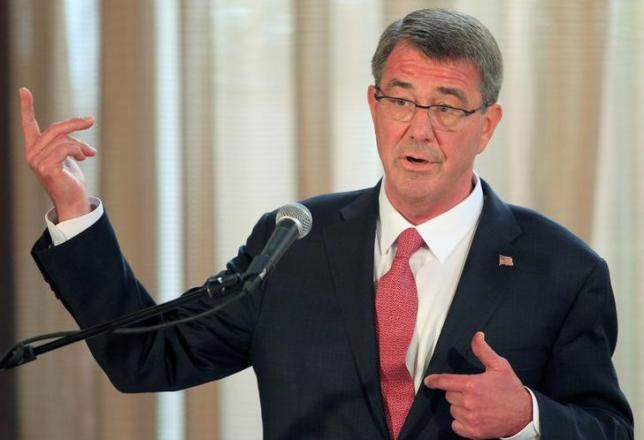 Visiting U.S. Defense Secretary Ash Carter gestures during a joint press conference with his Filipino counterpart Voltaire Gazmin (not pictured) at the presidential palace in Manila April 14, 2016. PHOTO: REUTERS