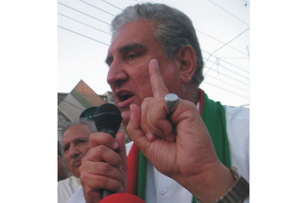 PTI leader Shah Mehmood Qureshi addressing party workers. PHOTO: EXPRESS