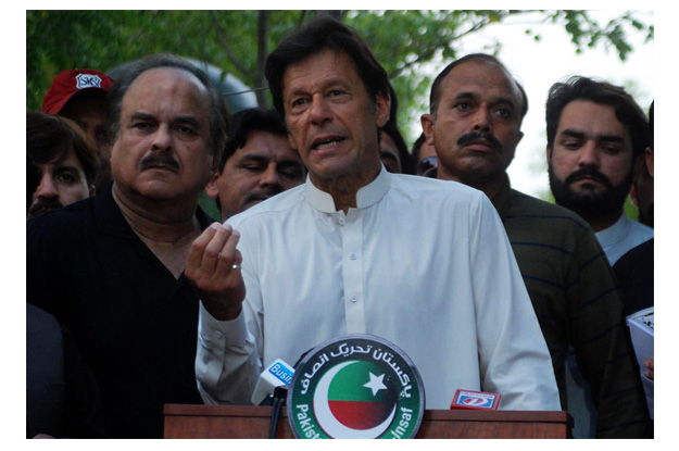 Imran Khan talking to media persons in islamabad. PHOTO: ONLINE