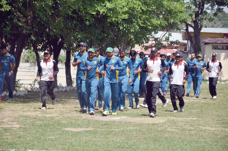 Pakistan players jog during the Kakul fitness camp to prepare for the upcoming tour of England. PHOTO COURTESY: PCB