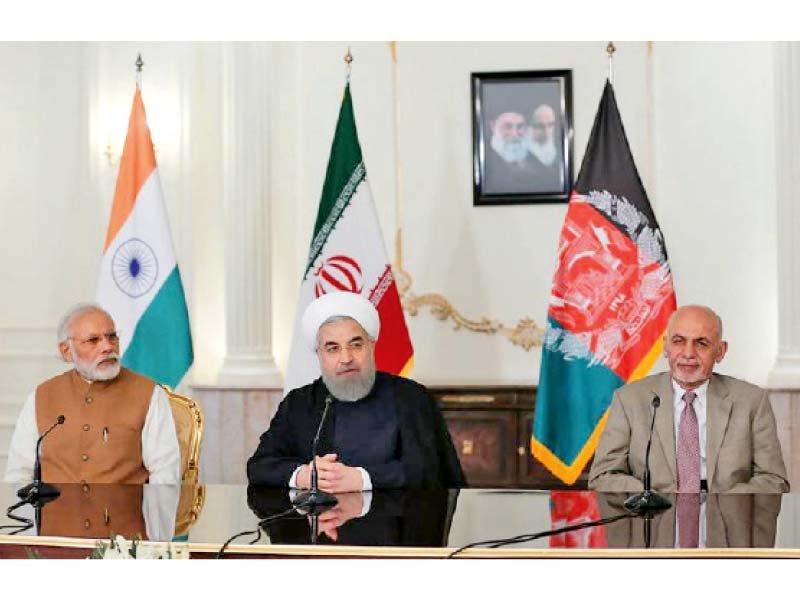 Leaders of Iran, India and Afghanistan at the signing of a transit trade agreement on Chabahar port. PHOTO COURTESY: RADIO PAKISTAN