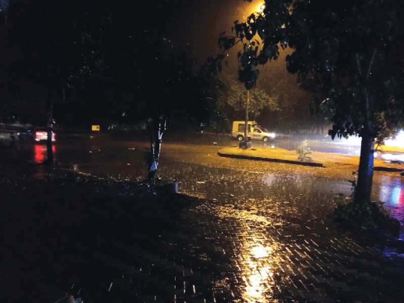 Given the fact that hail was a rare occurrence in the middle of peak summer season, most locals were of the opinion that in the long term it was a matter of concern. PHOTO: EMRAN ABBAS/EXPRESS