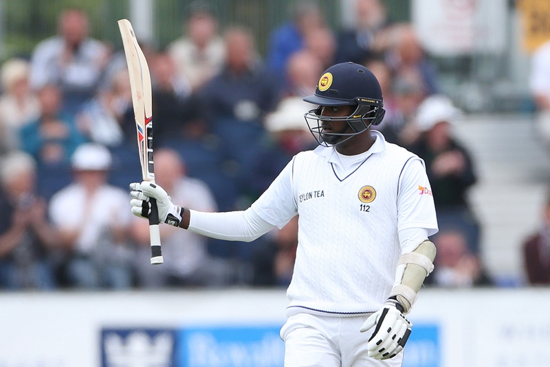 Angelo Matthews celebrates after scoring 50 on the third day of the second test cricket match between England and Sri Lanka at the Riverside in Chester Le Street, England on May 29, 2016. PHOTO: AFP