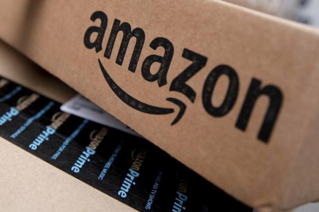 Amazon boxes are seen stacked for delivery. PHOTO: REUTERS