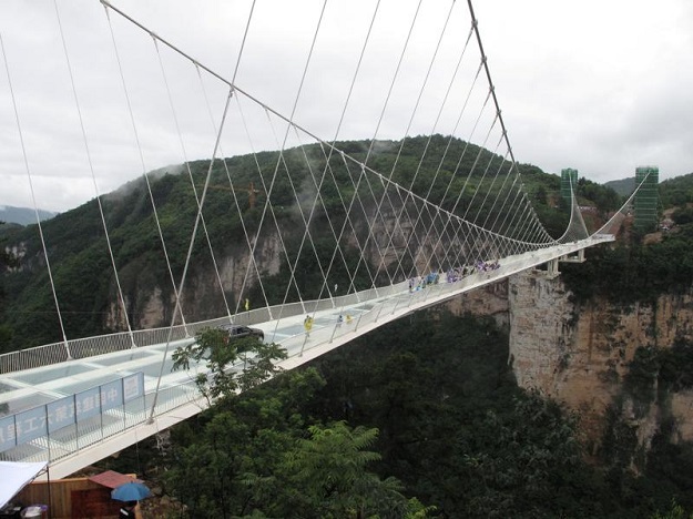 The glass suspension bridge, known as "Brave Men's Bridge", is located in Shiniuzhai National Geological Park. PHOTO: REUTERS