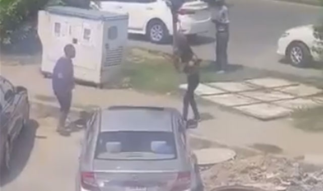 The transgender was seen confronting the businessman in an ATM and later following him to his car topless. Image: Video screen-grab