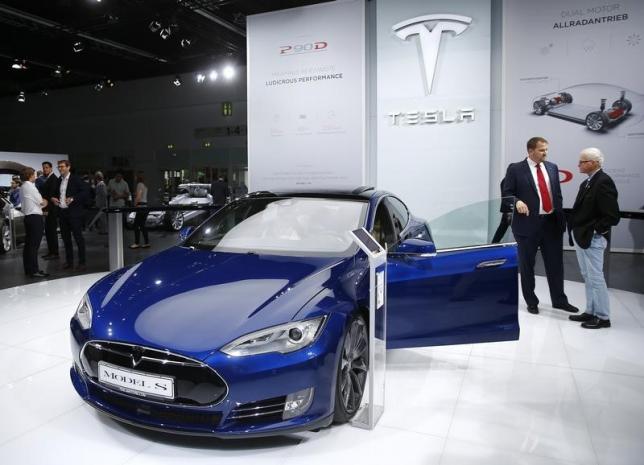 Elon Musk says had once reached out to Apple for acquiring Tesla