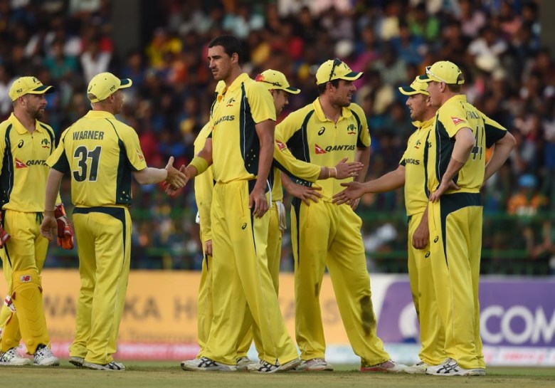 Australian cricketer Mitchell Starc (C) celebrates with his teammates after dismissing unseen Sri Lanka cricketer Milinda Siriwardana during the first One Day International (ODI) cricket match between Sri Lanka and Australia at the R Premadasa International Cricket Stadium in Colombo on August 21, 2016.
PHOTO: AFP