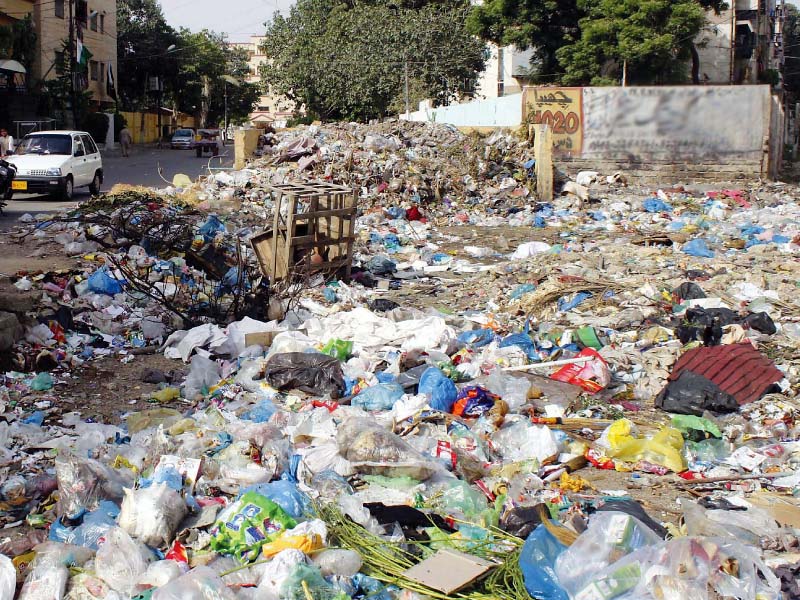 Huge heaps of garbage in Lines Area show the negligence of authorities towards keeping the city clean. PHOTO: FILE