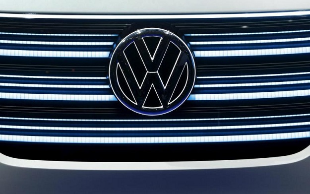 The Volkswagen emblem is shown on the grill of Volkswagen's BUDD-e electric vehicle. PHOTO: AFP