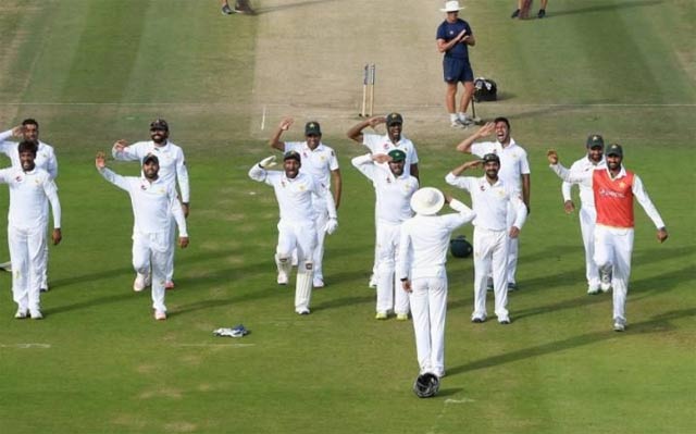 Azhar Ali told everyone to celebrate with glory. PHOTO: AFP
