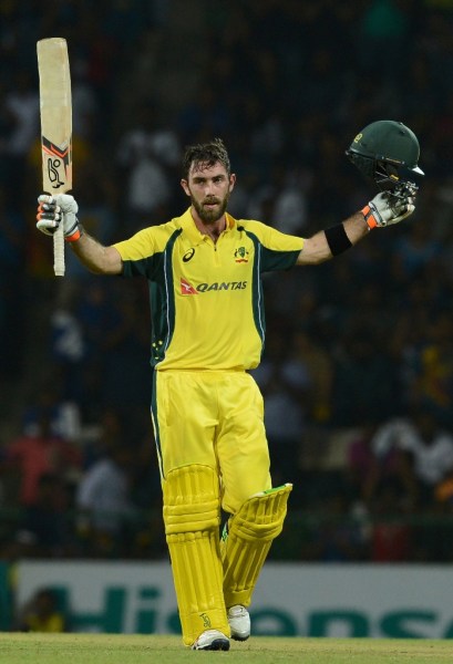 Glenn Maxwell raises his bat after scoring a century in Pallekele on September 6, 2016. PHOTO: AFP