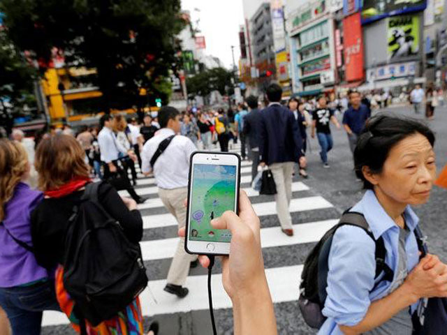 Pokémon user looking for Pokémon PHOTO: REUTERS