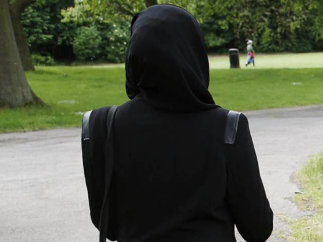The law bans clothing that partially or completely covers the face, referring to the burqa or the more common niqab. PHOTO: REUTERS