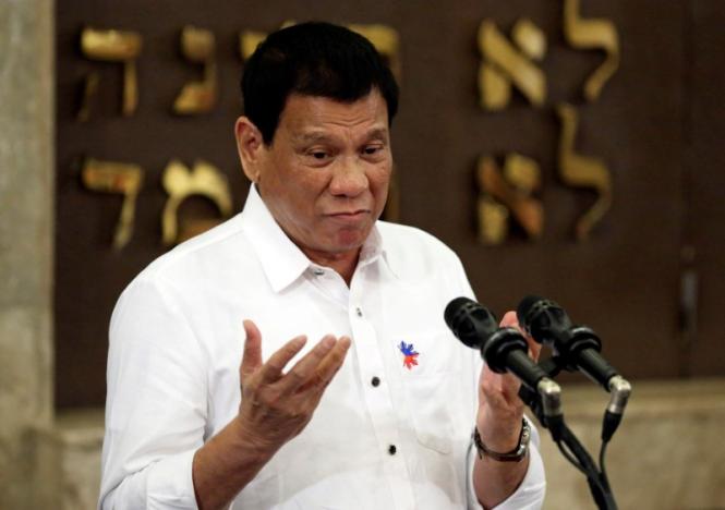 Philippine President Rodrigo Duterte gestures during his speech at the Beit Yaacov Synagogue, The Jewish Association of the Philippines in Makati city, metro Manila, Philippines October 4, 2016. PHOTO: REUTERS