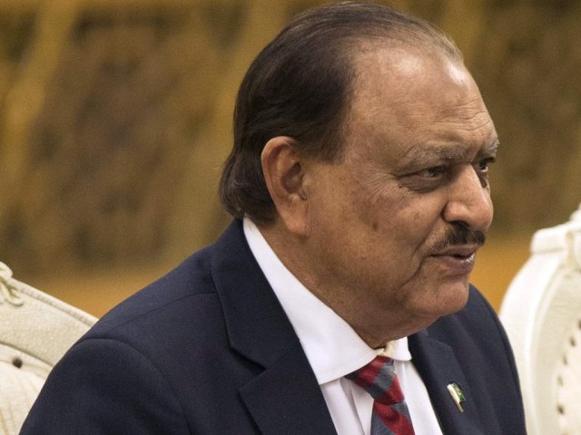 Spokesperson says Mamnoon Hussain needs to sign laws so they can be implemented.
PHOTO: AFP