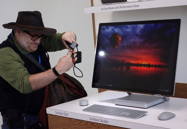 A man gets a look at the new Microsoft Surface Studio introduced at a Microsoft news conference PHOTO: AFP