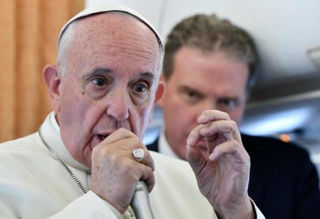Pope Francis speaks to journalists on his flight back to Rome, Italy November 1, 2016. PHOTO: REUTERS