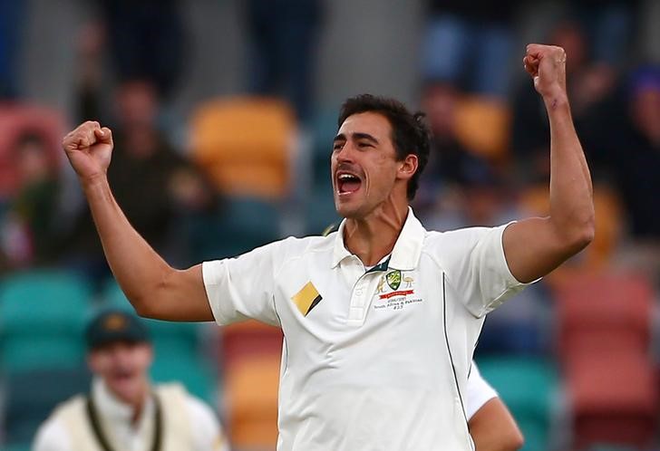 Mitchell Starc celebrates dismissing Dean Elgar. PHOTO: REUTERS/David Gray