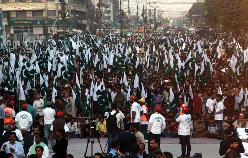 PSP supporters participate in a rally at Tibet Centre in Karachi. PHOTO: ATHAR KHAN/ EXPRESS