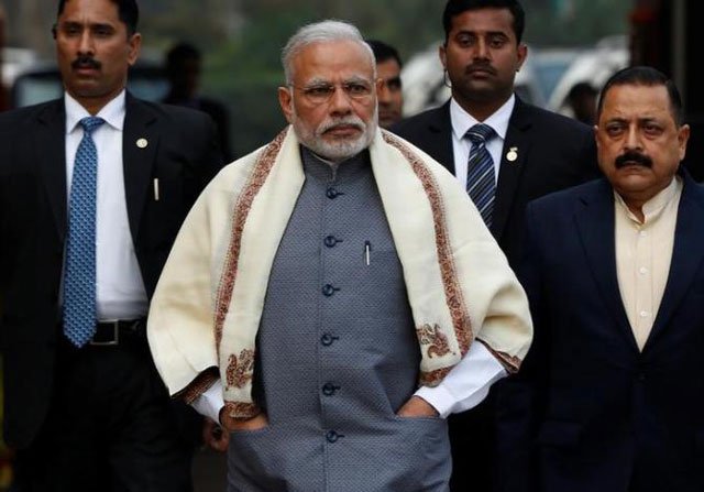 Prime Minister Narendra Modi walks to speak with the media as he arrives at the parliament house to attend the first day of the budget session, in New Delhi, January 31, 2017. PHOTO: REUTERS