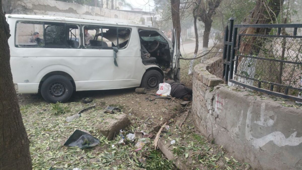 The blast targeted a government van (A-5597), while it was on its way to Judges Colony in the Hayatabad, Peshawar. PHOTO: IFTIKHAR FIRDOUS
