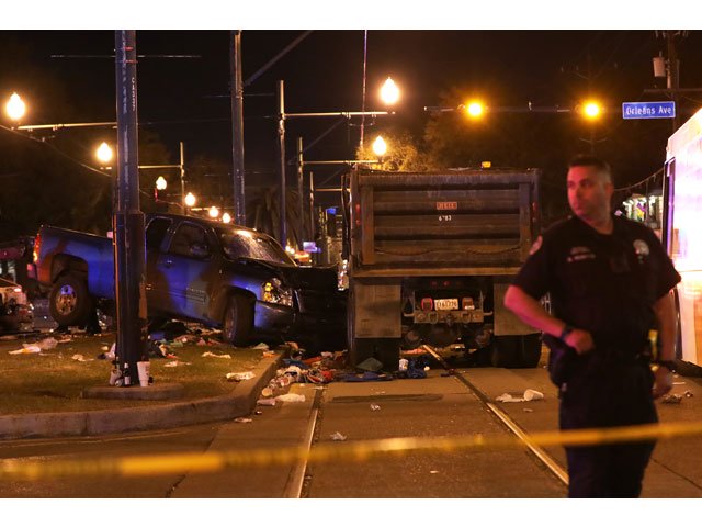 A vehicle is seen crashed along the Endymion parade  route at Orleans and Carollton during Mardi Gras in New Orleans, Louisiana US, February 25, 2017. PHOTO: REUTERS