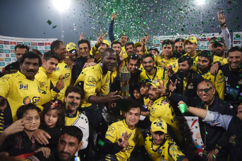 Cricketers of Peshawar Zalmi their victory over Quetta Gladiators in the final cricket match of the Pakistan Super League (PSL) at The Gaddafi Cricket Stadium in Lahore on March 5, 2017. 
PHOTO: AFP