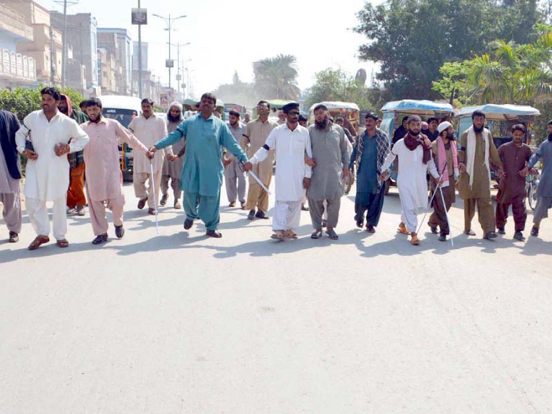 Protesters march towards Kutchery Chowk. PHOTO: ONLINE