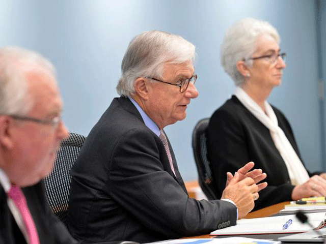 Officials from the Royal Commission into Institutional Responses to Child Sexual Abuse, (L-R) Commissioner Andrew Murray, Justice Peter McClellan, and Justice Jennifer Coate participate on the opening day of their public hearing into the Anglican Church of Australia in Sydney, Australia, March, 17 2017. PHOTO: REUTERS