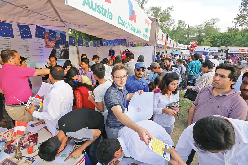 people take part in various activities during the Euro Village Festival being held at Lok Virsa. Photos Express/agencies