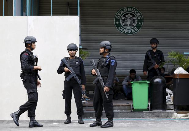 Indonesian police stand guard at the site of a militant attack in central Jakarta, Indonesia in this January 16, 2016 file photo. PHOTO: REUTERS