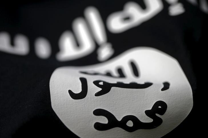 An Islamic State flag is seen in this picture illustration. PHOTO: REUTERS