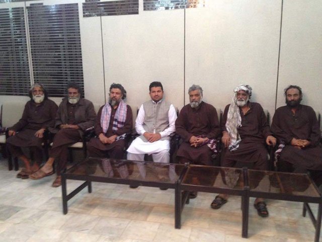 The six employee, who were abducted in DI Khan last year by the TTP Sajna faction, in Wana, South Waziristan after their release. PHOTO: Express