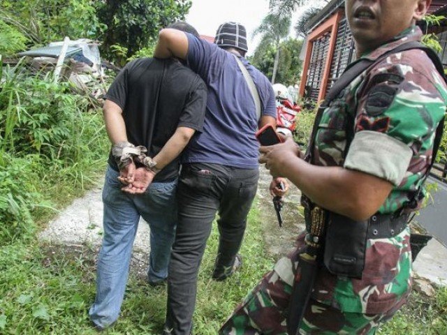 32 inmates escape from the jail in Jambi city on western Sumatra island. PHOTO: REUTERS
