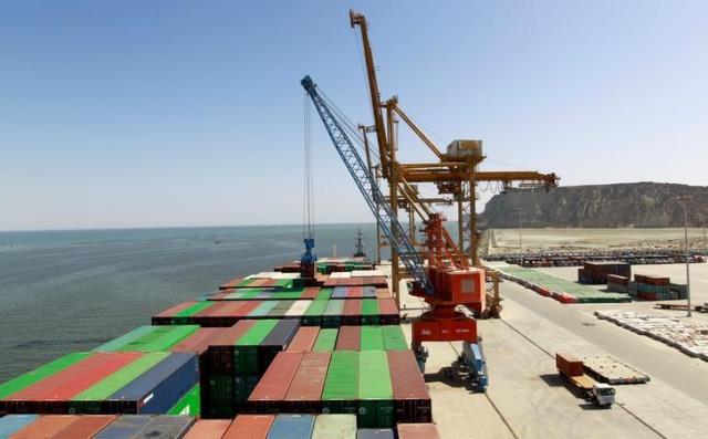 A container is loaded on to the Cosco Wellington, the first container ship to depart after the inauguration of the China Pakistan Economic Corridor port in Gwadar November 13, 2016. PHOTO: REUTERS