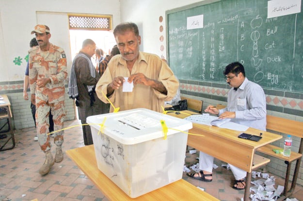 The by-election proceeded in a by and large peaceful manner due to the presence of law enforcers. PHOTO: ATHAR KHAN/EXPRESS