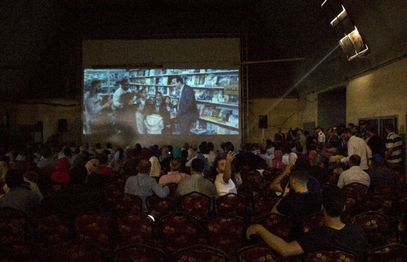Palestinians attend the screening of "10 Years" at the Samer Cinema in Gaza City on August 26, 2017. PHOTO: AFP