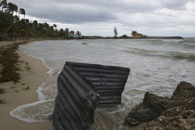 A picture taken on September 6, 2017 shows a general view of the Pointe de la Verdure beach in Gosier, on the French overseas island of Guadeloupe, as high winds from Hurricane Irma hit the island. Monster Hurricane Irma slammed into Caribbean islands today after making landfall in Barbuda, packing ferocious winds and causing major flooding in low-lying areas. As the rare Category Five storm barreled its way across the Caribbean, it brought gusting winds of up to 185 miles per hour (294 kilometers per hour), weather experts said. PHOTO: AFP.