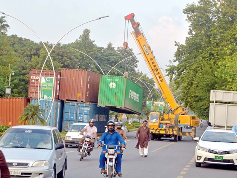 Heavy police contingents and containers are seen ahead of the protests. PHOTO: EXPRESS