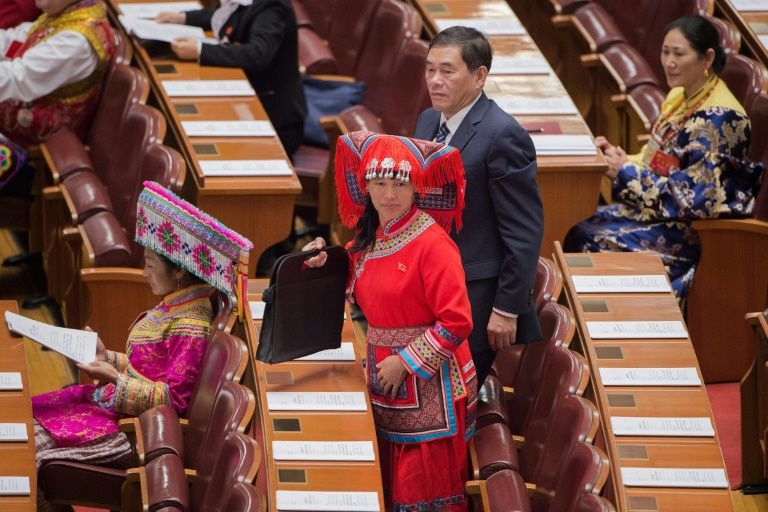 Women represent only a quarter of the 2,300 delegates attending the week-long congress held just twice a decade, highlighting China's yawning gender gap. PHOTO: AFP