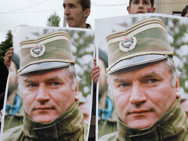 Bosnian Serbs hold posters depicting Ratko Mladic during a protest in Mladic's hometown of Kalinovik in 2011. PHOTO: AP
