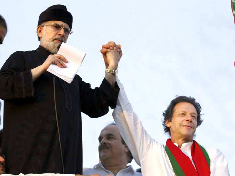 Tahirul Qadri and Imran Khan. PHOTO: AFP