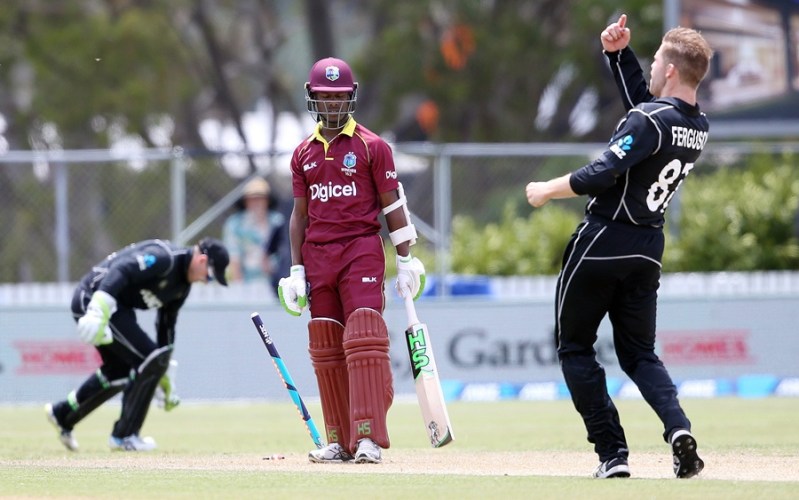 Jason Mohammed of the West Indies (C) is bowled by Lockie Ferguson (R) of New Zealand during the first ODI cricket match between New Zealand and the West Indies at Cobham Oval in Whangarei on December 20, 2017. PHOTO: AFP
