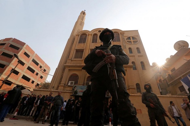 Security forces stand guard at the site of attack on a church in the Helwan district south of Cairo, Egypt December 29, 2017.
PHOTO: REUTERS